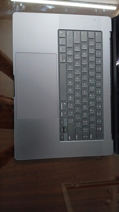 Apple MacBook Pro keyboard and large trackpad